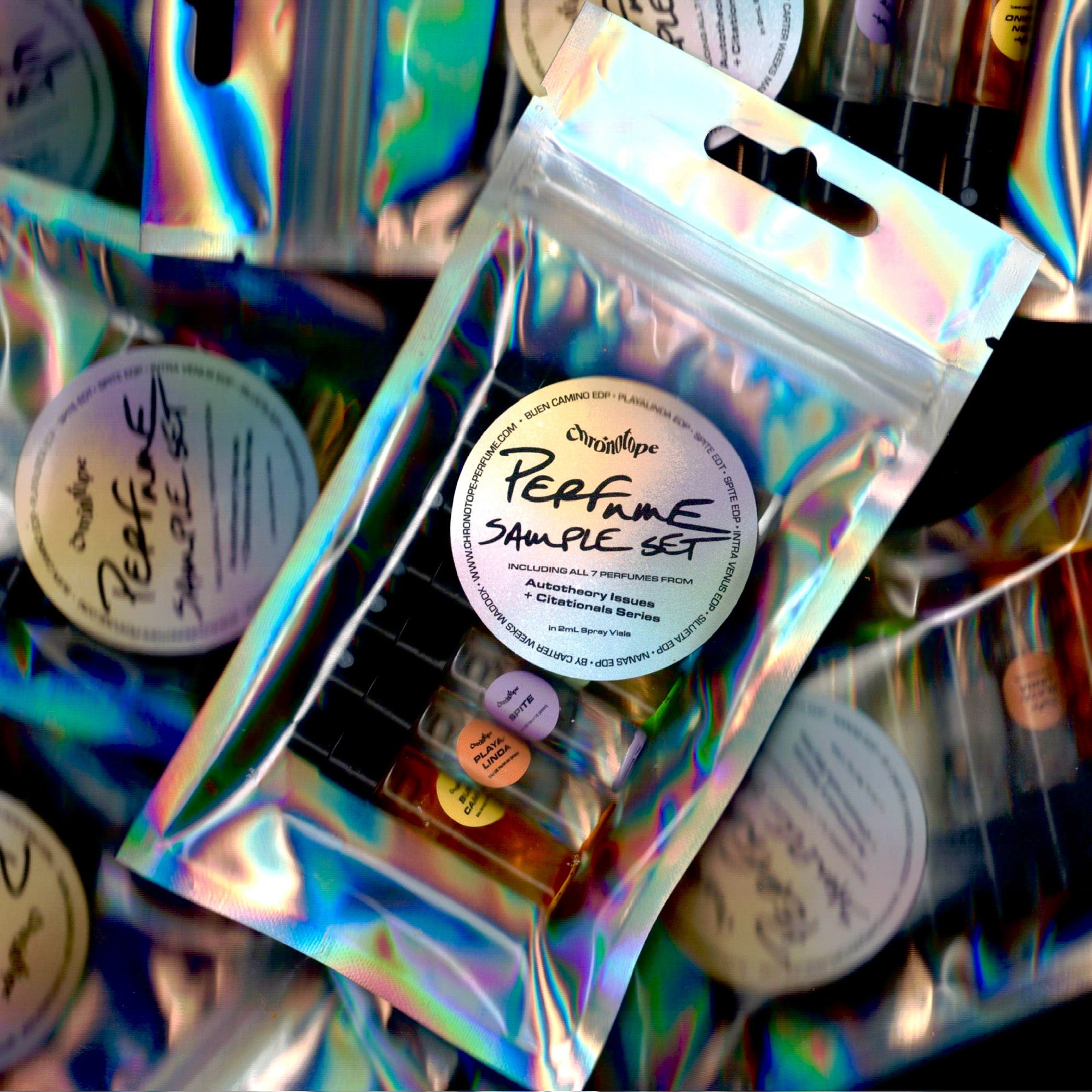 Chronotope Core Collection Sample Set—seven avant-garde, niche artisan perfumes fragrances packaged in holographic bag.